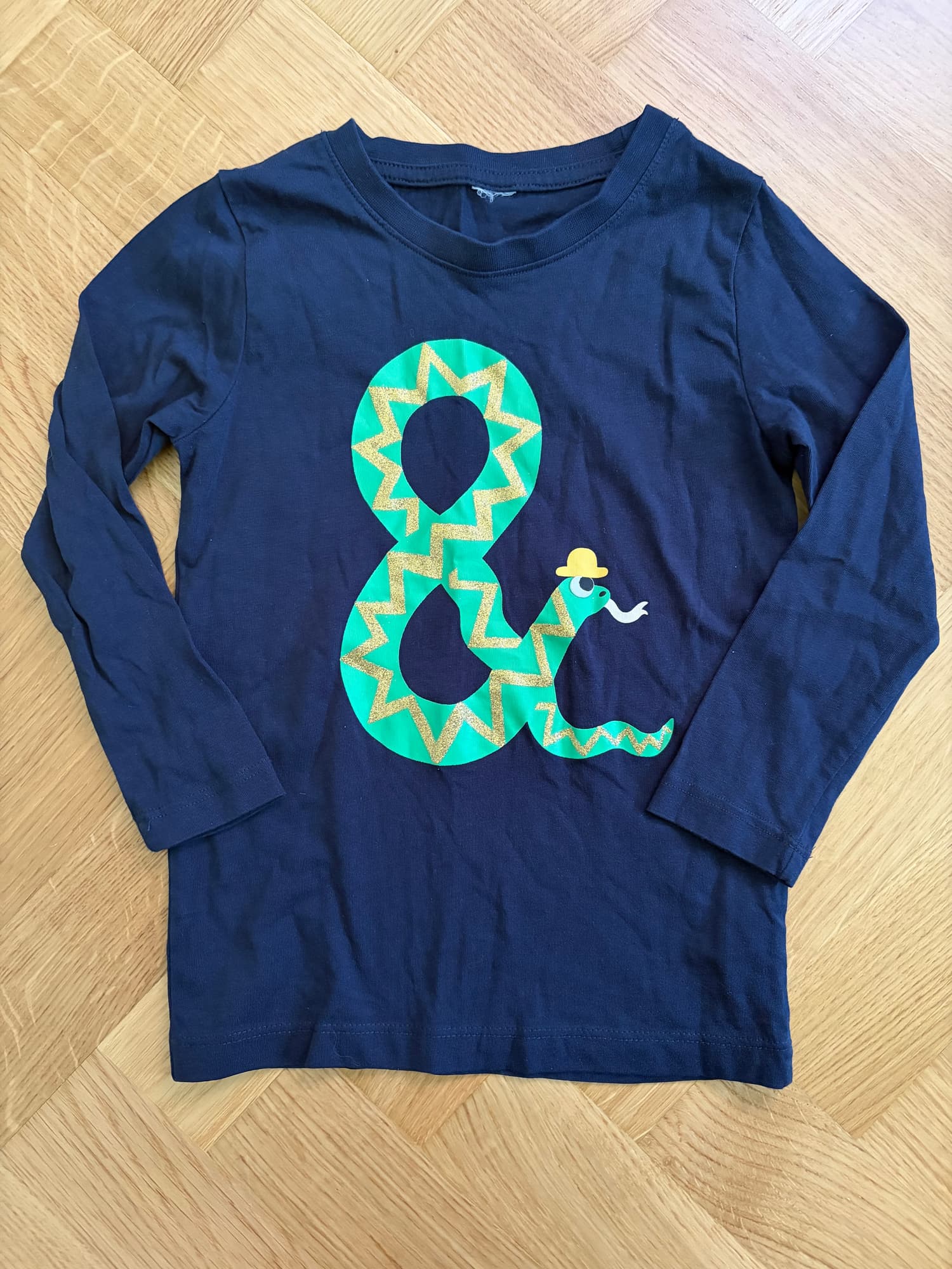 Blå långärmad tröja med ormmotiv, stl 92